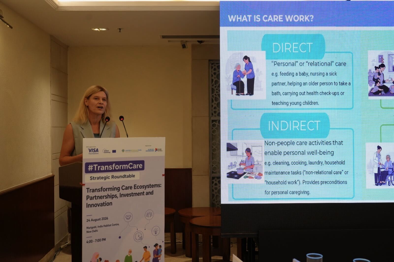 A speaker presenting at the #TransformCare Strategic Roundtable in New Delhi.